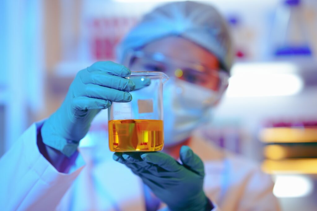 Asian female scientist passionately conducts experiments in a laboratory